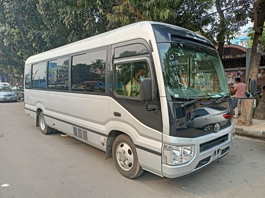 Tourist Bus Booking in Motijheel Dhaka Bangladesh. Nissan Civilian Daily, Weekly, Monthly AC Mini Bus Service in Bangladesh